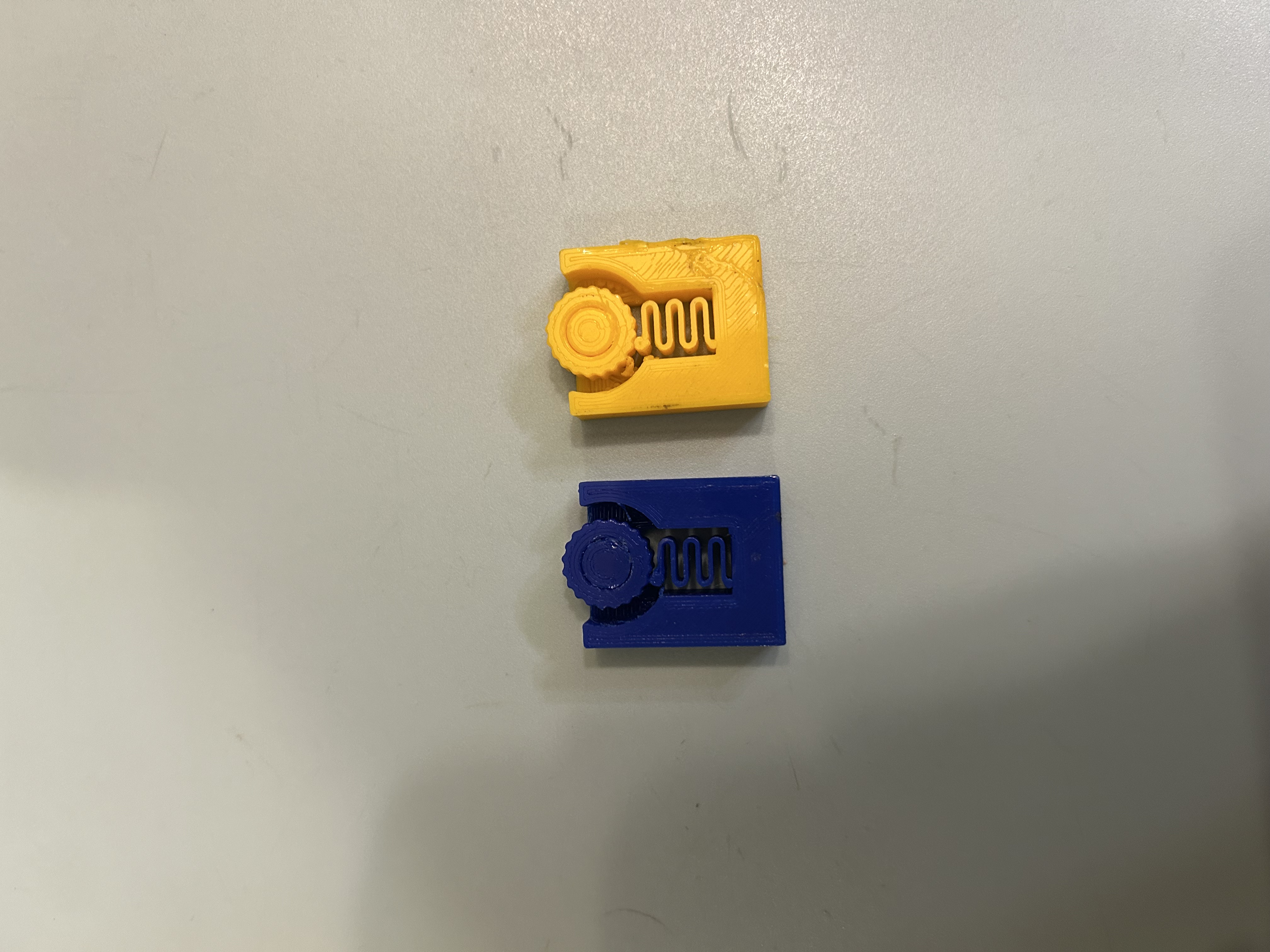 Blue and yellow early prototypes viewed from above